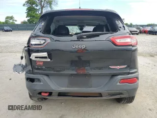 2014 Jeep Cherokee Trailhawk with VIN 1C4PJMBB2EW173458, listed as a Copart auction lot 56146355 with Not provided miles and Salvage title. Bid and sale history available at DreamBid. Image 6.