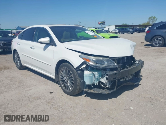 2016 Toyota Avalon Limited with VIN 4T1BK1EB7GU241409, listed as a IAAI auction lot 42013546 with 142,786 mi miles and . Bid and sale history available at carsss.com. Image 1.