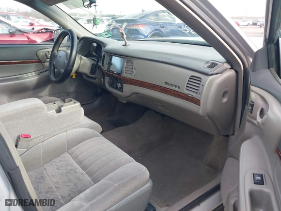 2003 Chevrolet Impala with VIN 2G1WF52E639136361, listed as a IAAI auction lot 41216021 with 135,055 mi miles. Bid and sale history available at carsss.com. Image 5.