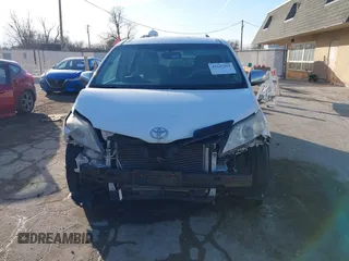 2014 Toyota Sienna LE AAS with VIN 5TDKK3DC2ES483679, listed as a IAAI auction lot 41547261 with 142,697 mi miles. Bid and sale history available at carsss.com. Image 13.