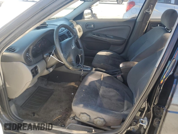 2005 Nissan Sentra S z VIN 3N1CB51DX5L543147, wystawiony jako Copart lot #87373924 z przebiegiem 246 922 mil mil oraz Szkoda całkowita • Salvage title. Historia ofert i sprzedaży dostępna na DreamBid. Obrazek 7.