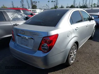 2012 Chevrolet Sonic LT with VIN 1G1JC5SH9C4136290, listed as a IAAI auction lot 42034254 with 273,427 mi miles and . Bid and sale history available at DreamBid. Image 4.