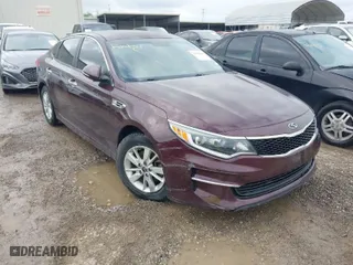 2016 Kia Optima LX with VIN 5XXGT4L3XGG027430, listed as a IAAI auction lot 41940146 with 75,456 mi miles. Bid and sale history available at carsss.com. Image 1.