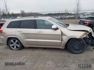 2015 Jeep Grand Cherokee Overland with VIN 1C4RJFCG5FC928085, listed as a IAAI auction lot 41540870 with 93,846 mi miles. Bid and sale history available at carsss.com. Image 13.