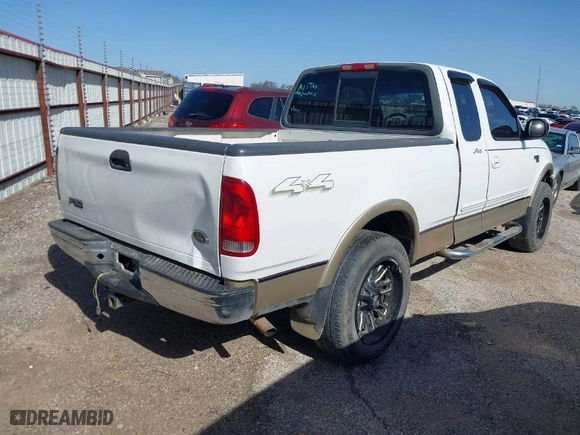 2000 Ford F-150 XL with VIN 1FTRX18W6YNA72319, listed as a IAAI auction lot 41682748 with 265,559 mi miles. Bid and sale history available at carsss.com. Image 4.