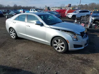 2014 Cadillac ATS Standard RWD with VIN 1G6AA5RX4E0132090, listed as a IAAI auction lot 41245878 with 57,103 mi miles. Bid and sale history available at carsss.com. Image 1.