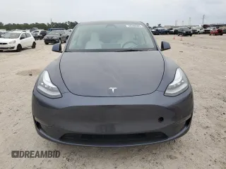 2022 Tesla Model Y Long Range with VIN 7SAYGDEE1NF315198, listed as a Copart auction lot 50399005 with 33,357 mi miles and Salvage Title. Bid and sale history available at DreamBid. Image 5.