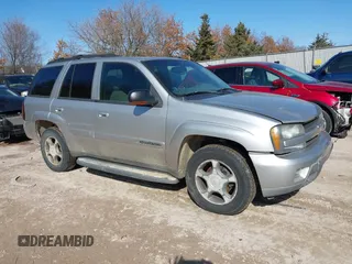 2004 Chevrolet TrailBlazer LS with VIN 1GNDT13S442119957, listed as a IAAI auction lot 41760671 with 233,032 mi miles. Bid and sale history available at carsss.com. Image 1.