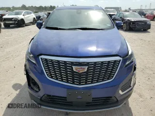 2023 Cadillac XT5 FWD Premium Luxury with VIN 1GYKNCRS3PZ154122, listed as a Copart auction lot 53667425 with 52,279 mi miles and Salvage Title. Bid and sale history available at carsss.com. Image 5.