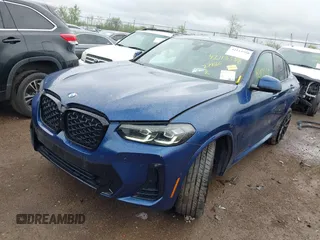 2023 BMW X4 xDrive30i z VIN 5UX33DT01P9P86340, wystawiony jako IAAI lot #42113558 z przebiegiem 27 226 mil mil oraz . Historia ofert i sprzedaży dostępna na DreamBid. Obrazek 18.