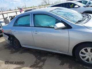 2009 Toyota Corolla with VIN 1NXBU40E39Z092092, listed as a IAAI auction lot 41881741 with 144,309 mi miles. Bid and sale history available at carsss.com. Image 13.