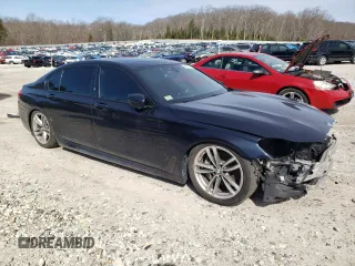 2019 BMW 7 Series 740i xDrive с VIN WBA7E4C51KGV70305, выставлен на аукционе Copart как лот 50009705 с пробегом 129 427 миль миль и Списание • Salvage title. История ставок и продаж доступна на DreamBid. Изображение 4.