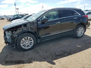 2019 Cadillac XT5 AWD with VIN 1GYKNBRS1KZ176462, listed as a Copart auction lot 57211695 with 37,112 mi miles and Salvage title. Bid and sale history available at DreamBid. Image 1.