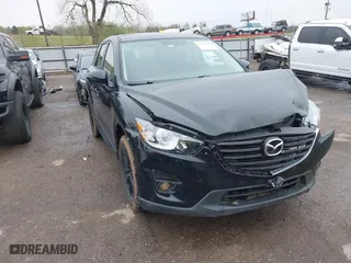 2016 Mazda CX-5 Touring with VIN JM3KE4CY1G0625916, listed as a IAAI auction lot 41971170 with 182,474 mi miles. Bid and sale history available at carsss.com. Image 1.