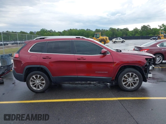 2019 Jeep Cherokee Latitude Plus with VIN 1C4PJMLB2KD104856, listed as a IAAI auction lot 42097709 with 89,552 mi miles and . Bid and sale history available at DreamBid. Image 14.