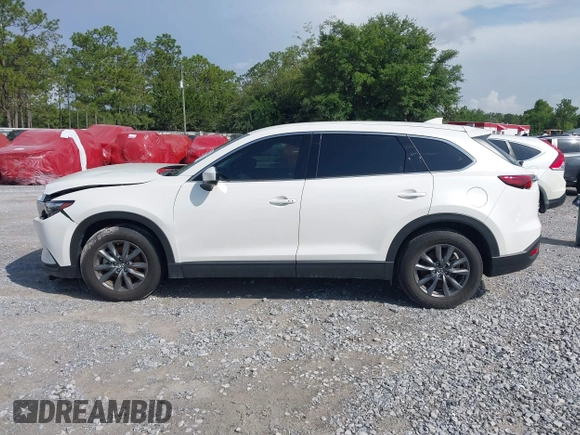 2022 Mazda CX-9 Touring with VIN JM3TCBCY4N0604912, listed as a IAAI auction lot 42456794 with 49,853 mi miles and . Bid and sale history available at DreamBid. Image 14.