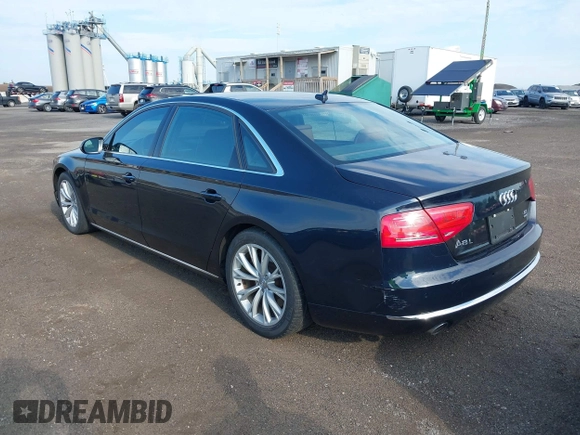 2011 Audi A8 with VIN WAURVAFD4BN018884, listed as a IAAI auction lot 42693000 with 116,952 mi miles and . Bid and sale history available at DreamBid. Image 3.