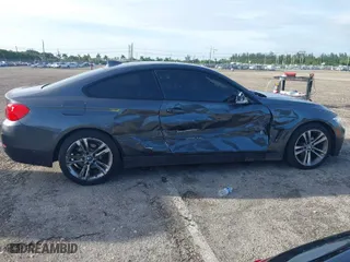 2014 BMW 4 Series 428i xDrive with VIN WBA3N5C57EK196790, listed as a IAAI auction lot 40571670 with 108,114 mi miles. Bid and sale history available at carsss.com. Image 13.
