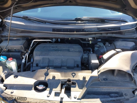 2016 Honda Odyssey SE with VIN 5FNRL5H34GB139571, listed as a IAAI auction lot 41602695 with 118,960 mi miles. Bid and sale history available at carsss.com. Image 10.