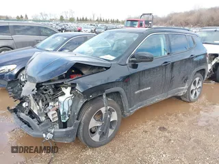 2020 Jeep Compass Latitude with VIN 3C4NJDBB1LT112676, listed as a IAAI auction lot 41651583 with 73,528 mi miles. Bid and sale history available at carsss.com. Image 2.