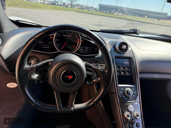 2016 McLaren 650S z VIN SBM11FAAXGW005605, wystawiony jako Copart lot #53181285 z przebiegiem 16 800 mil mil oraz Tytuł czysty. Historia ofert i sprzedaży dostępna na DreamBid. Obrazek 9.