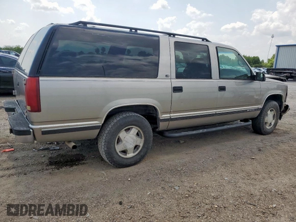 1999 Chevrolet Suburban z VIN 3GNFK16R2XG191868, wystawiony jako Copart lot #57620165 z przebiegiem 128 526 mil mil oraz Szkoda całkowita • Salvage title. Historia ofert i sprzedaży dostępna na DreamBid. Obrazek 3.