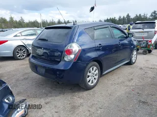 2009 Pontiac Vibe w/1SB with VIN 5Y2SL67029Z431635, listed as a IAAI auction lot 41889699 with 133,773 mi miles. Bid and sale history available at carsss.com. Image 4.