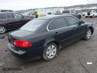 2007 Kia Optima LX with VIN KNAGE123175133499, listed as a IAAI auction lot 41958955 with 132,480 mi miles. Bid and sale history available at carsss.com. Image 4.