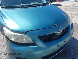 2009 Toyota Corolla with VIN JTDBL40EX99034801, listed as a IAAI auction lot 41943591 with 204,674 mi miles. Bid and sale history available at carsss.com. Image 12.