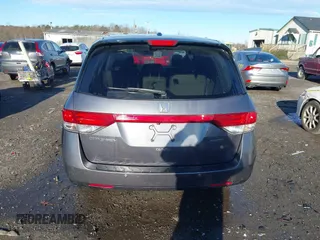 2014 Honda Odyssey Touring with VIN 5FNRL5H94EB081267, listed as a IAAI auction lot 41199509 with 146,827 mi miles and . Bid and sale history available at DreamBid. Image 16.