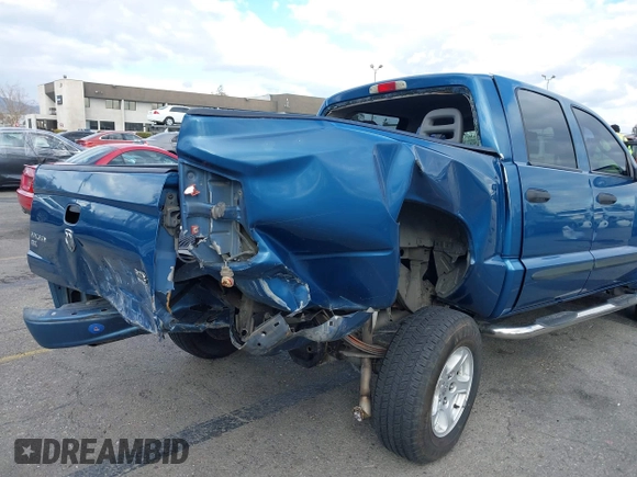 2005 Dodge Dakota SLT with VIN 1D7HE48N85S261745, listed as a IAAI auction lot 41401763 with 153,799 mi miles and . Bid and sale history available at DreamBid. Image 6.