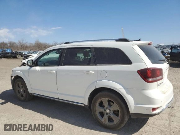 2017 Dodge Journey Crossroad Plus with VIN 3C4PDDGG0HT513681, listed as a Copart auction lot 50702115 with 131,448 mi miles and Salvage title. Bid and sale history available at DreamBid. Image 2.