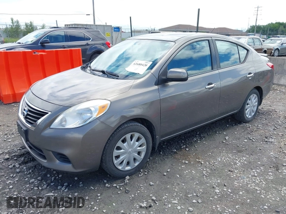 2013 Nissan Versa SV with VIN 3N1CN7AP9DL867511, listed as a IAAI auction lot 42680420 with 158,082 mi miles and . Bid and sale history available at DreamBid. Image 2.