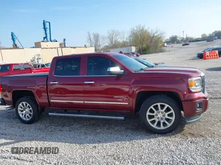 2015 GMC Sierra 1500 Denali with VIN 3GTU2WEC6FG187427, listed as a IAAI auction lot 41874355 with 166,913 mi miles and . Bid and sale history available at DreamBid. Image 13.
