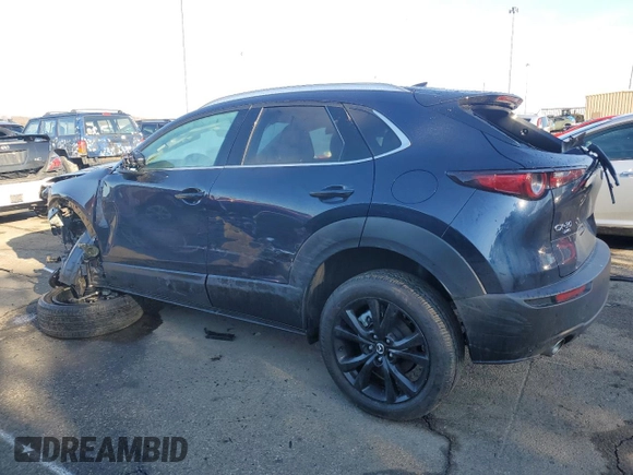 2023 Mazda CX-30 Premium Plus with VIN 3MVDMBEY9PM557107, listed as a Copart auction lot 46893065 with 10,404 mi miles and Salvage title. Bid and sale history available at DreamBid. Image 2.