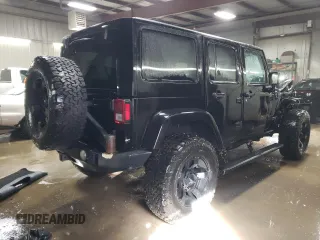 2015 Jeep Wrangler Unlimited Rubicon Hard Rock with VIN 1C4HJWFG4FL676868, listed as a Copart auction lot 48489525 with 100,771 mi miles and Salvage title. Bid and sale history available at DreamBid. Image 3.
