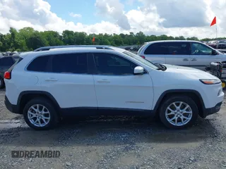 2018 Jeep Cherokee Latitude with VIN 1C4PJLCB1JD553390, listed as a IAAI auction lot 42233220 with 130,418 mi miles and . Bid and sale history available at DreamBid. Image 13.