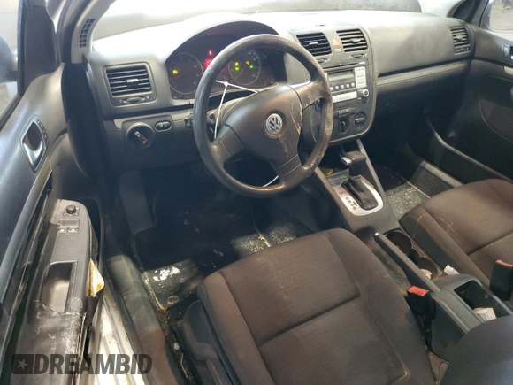 2009 Volkswagen Rabbit S with VIN WVWBB71K29W003438, listed as a Copart auction lot 46041015 with 128,351 mi miles and Clean title. Bid and sale history available at DreamBid. Image 8.