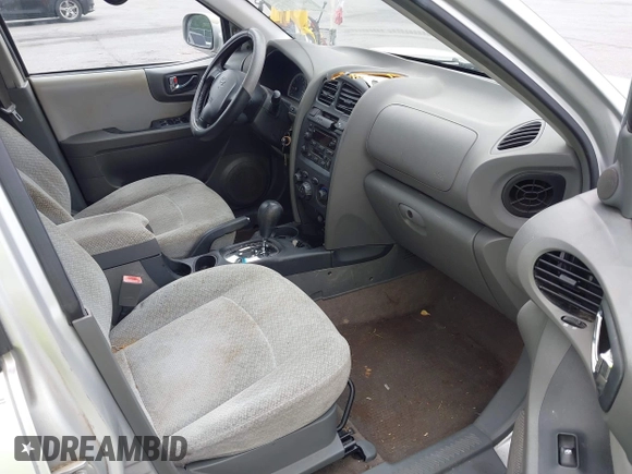 2006 Hyundai Santa Fe GLS with VIN KM8SC13D26U079706, listed as a IAAI auction lot 42464991 with 133,735 mi miles and . Bid and sale history available at DreamBid. Image 5.