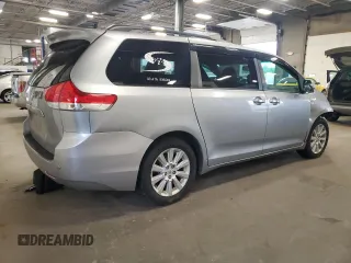 2012 Toyota Sienna XLE with VIN 5TDDK3DC2CS031088, listed as a Copart auction lot 60642845 with 186,586 mi miles and Salvage title. Bid and sale history available at DreamBid. Image 3.