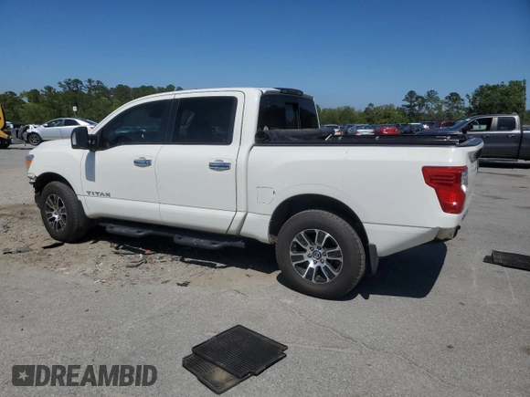 2021 Nissan Titan SV с VIN 1N6AA1EDXMN527522, выставлен на аукционе Copart как лот 52826715 с пробегом 79 450 миль миль и Списание • Salvage title. История ставок и продаж доступна на DreamBid. Изображение 2.