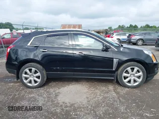 2015 Cadillac SRX Performance Collection with VIN 3GYFNFE35FS591343, listed as a IAAI auction lot 42644949 with 118,718 mi miles and . Bid and sale history available at DreamBid. Image 14.