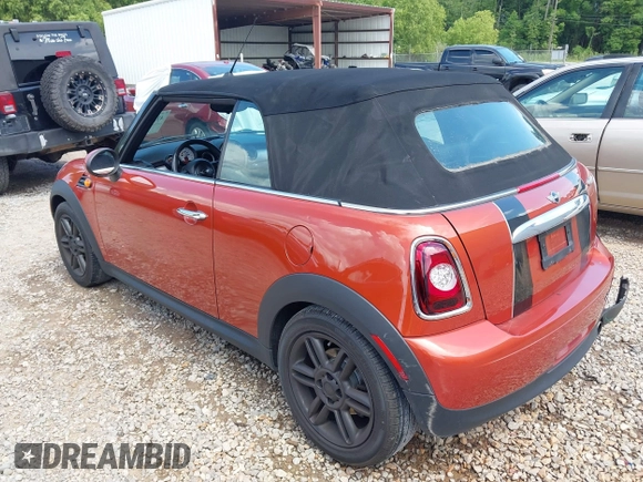 2011 MINI Convertible with VIN WMWZN3C57BTZ89303, listed as a IAAI auction lot 42352242 with 146,448 mi miles and . Bid and sale history available at DreamBid. Image 3.