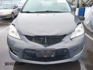 2009 Mazda 5 Touring with VIN JM1CR29L690356302, listed as a IAAI auction lot 41573737 with 127,276 mi miles. Bid and sale history available at carsss.com. Image 6.