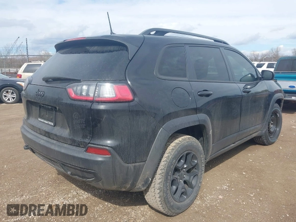 2022 Jeep Cherokee X with VIN 1C4PJMCX0ND527533, listed as a IAAI auction lot 41674822 with 36,300 mi miles. Bid and sale history available at carsss.com. Image 4.