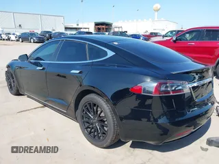 2021 Tesla Model S Long Range Plus with VIN 5YJSA1E28MF426080, listed as a IAAI auction lot 41979326 with 125,328 mi miles and . Bid and sale history available at DreamBid. Image 3.