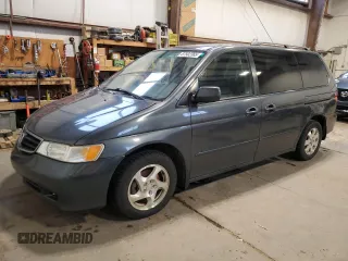 2003 Honda Odyssey EX with VIN 2HKRL18603H008412, listed as a Copart auction lot 87502365 with 352,773 mi miles and Salvage Title. Bid and sale history available at DreamBid. Image 1.