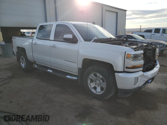 2016 Chevrolet Silverado 1500 LT with VIN 3GCUKREC3GG357911, listed as a Copart auction lot 43985735 with 145,647 mi miles and Salvage Title. Bid and sale history available at DreamBid. Image 4.