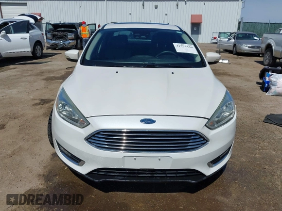 2015 Ford Focus Titanium с VIN 1FADP3J27FL341102, выставлен на аукционе IAAI как лот 41793450 с пробегом 96 465 миль миль и . История ставок и продаж доступна на DreamBid. Изображение 12.