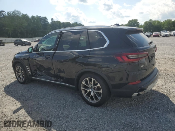 2021 BMW X5 xDrive45e with VIN 5UXTA6C02M9F50974, listed as a Copart auction lot 56358745 with 46,945 mi miles and Salvage title. Bid and sale history available at DreamBid. Image 2.